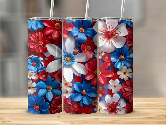 Three tumblers with patriotic floral designs on a wooden surface.