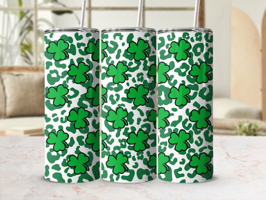 Green shamrocks and leopard print pattern on three tumblers.