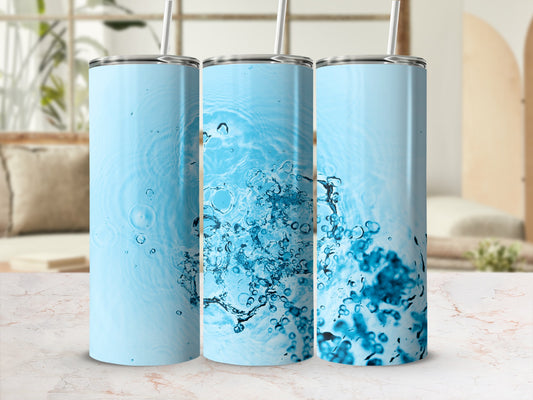 Light blue tumbler with water splash design.