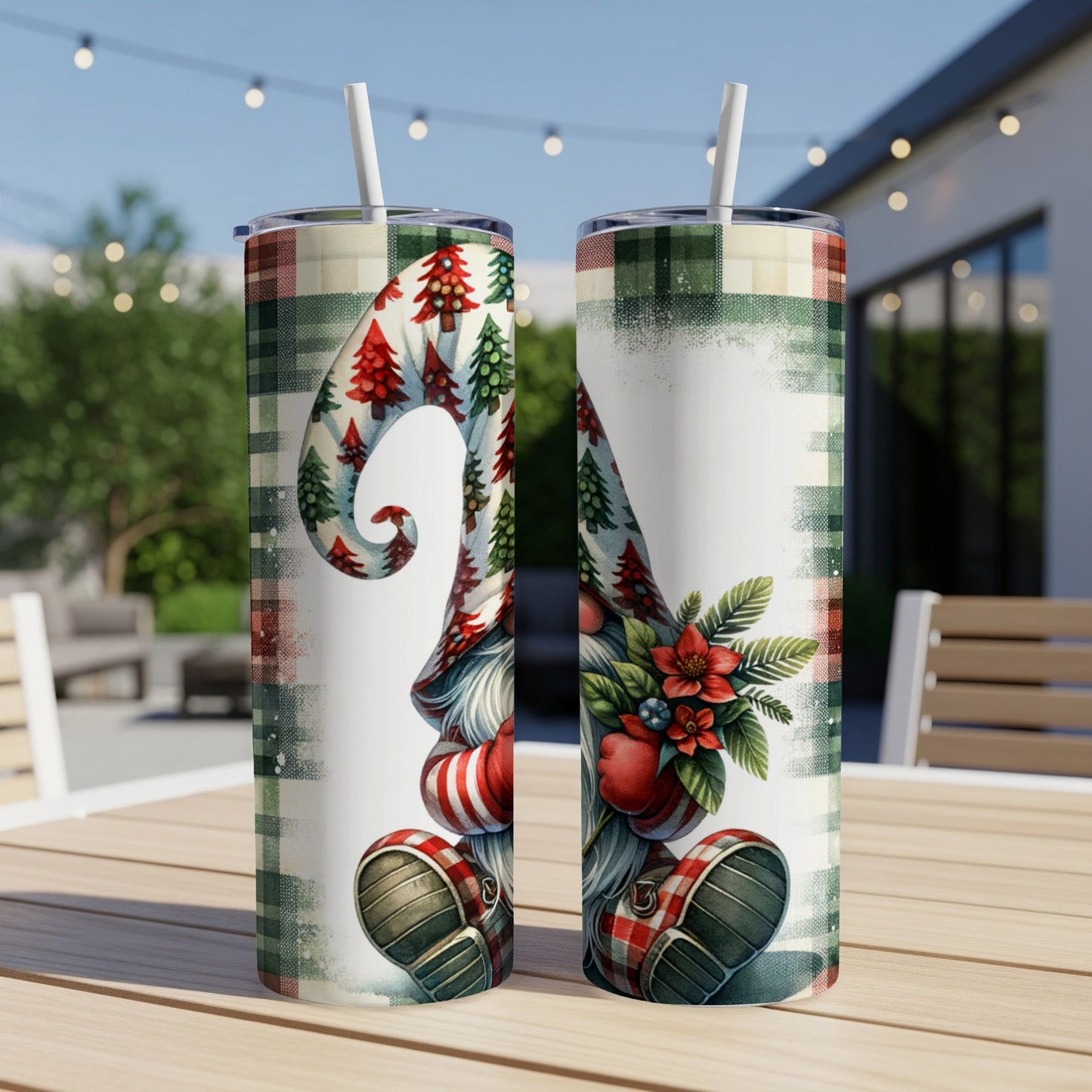 Two tumblers with a gnome design, featuring plaid and Christmas trees.