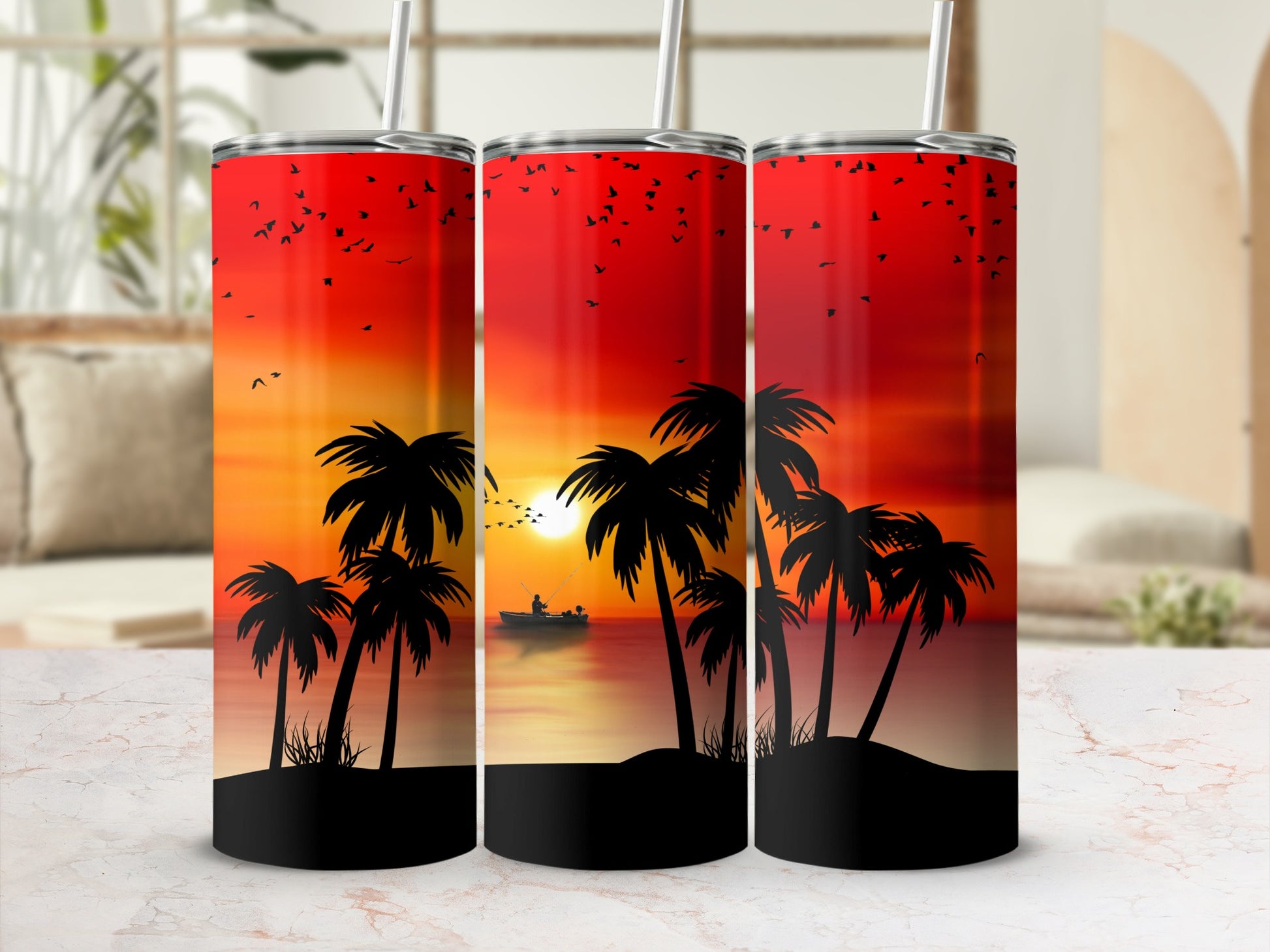 Three tumblers with a sunset beach scene featuring palm trees and a distant boat.