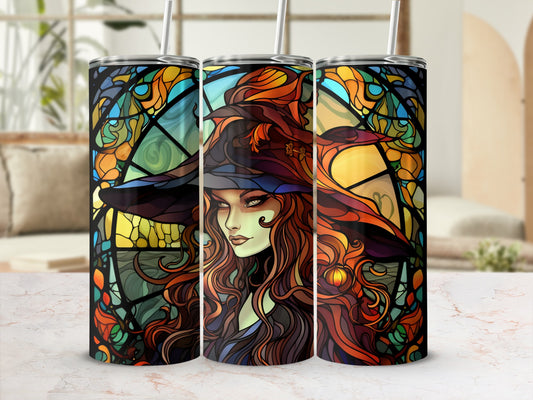 Stained glass design featuring a witch with fiery hair and a hat.