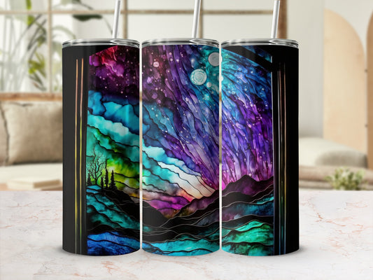 Three tumblers with a colorful galaxy and mountain design.