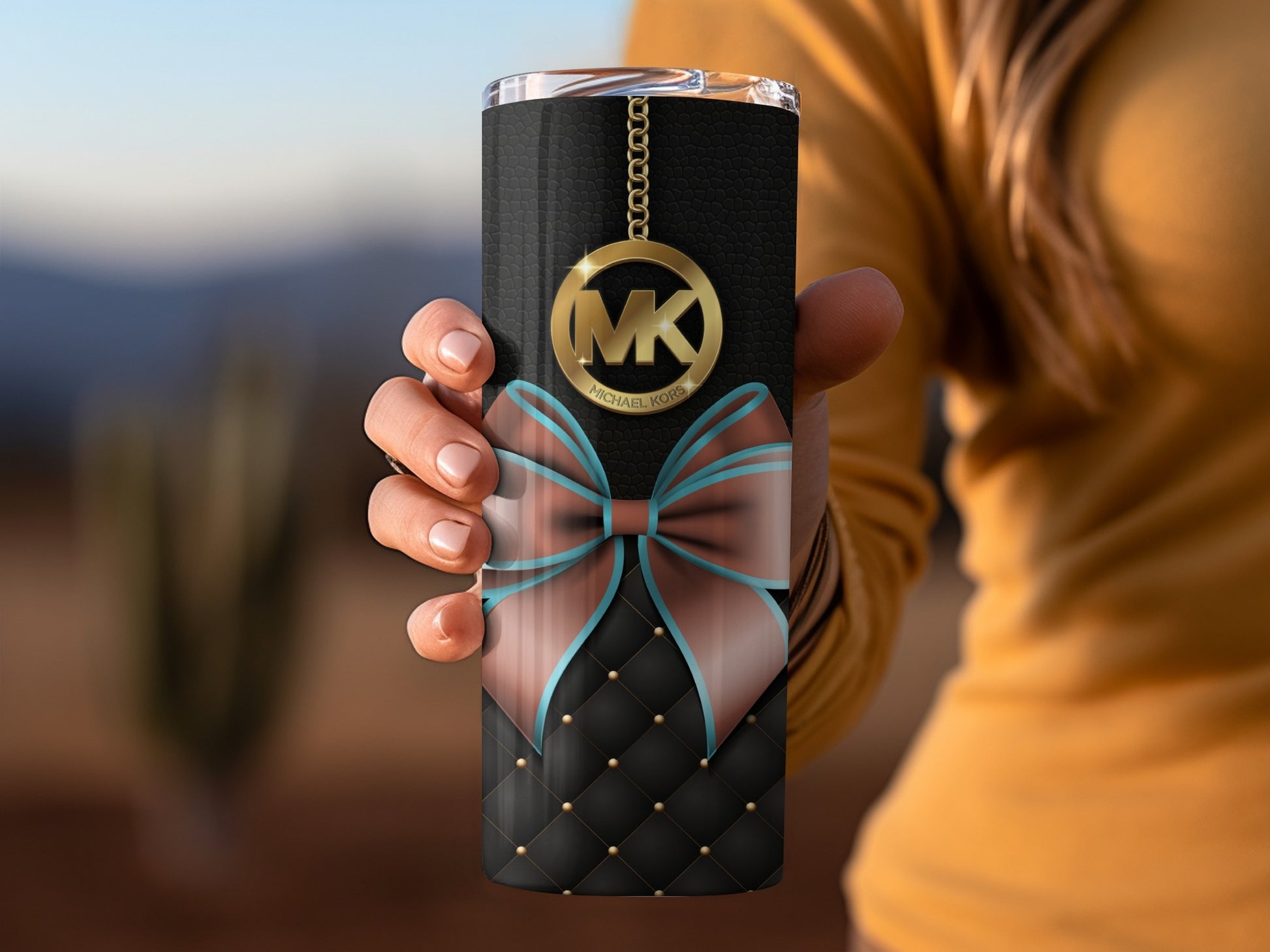 Elegant Black Tumbler with Blue Ribbon Accent
