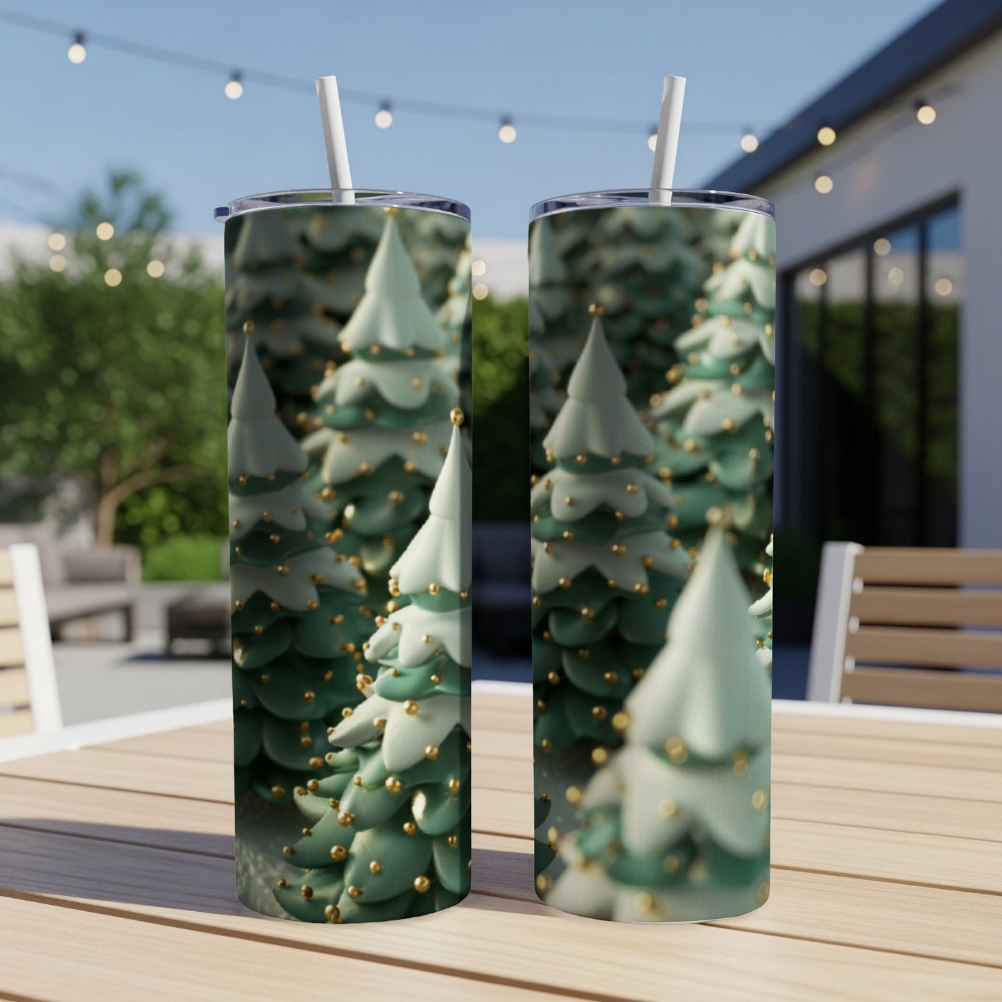 Two tall, slender tumblers with a repeating Christmas tree pattern.