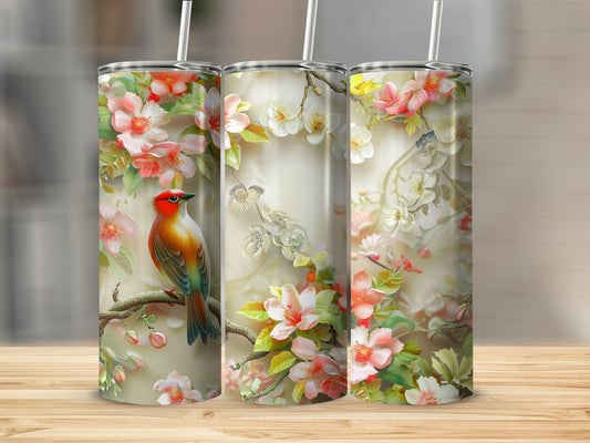 Floral bird tumbler with pink blossoms and green leaves.