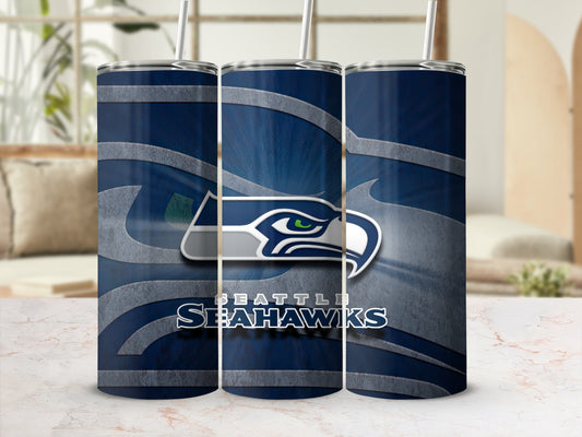Seattle Seahawks logo and text on a dark blue tumbler with gray accents.