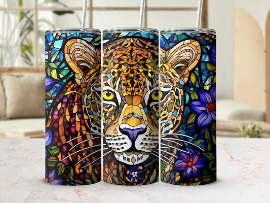 Stained glass jaguar face design on three tumblers with straws.