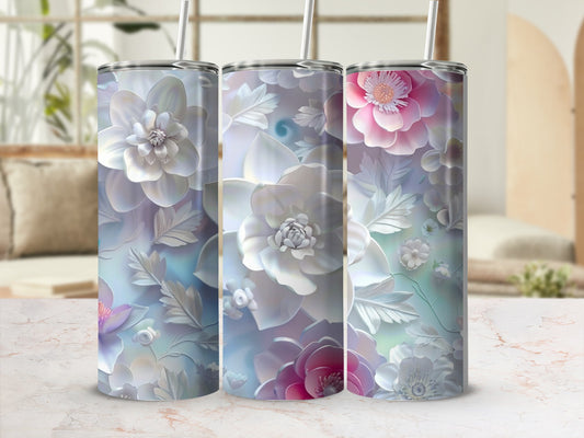 Three tumblers with a raised floral design in pastel colors.