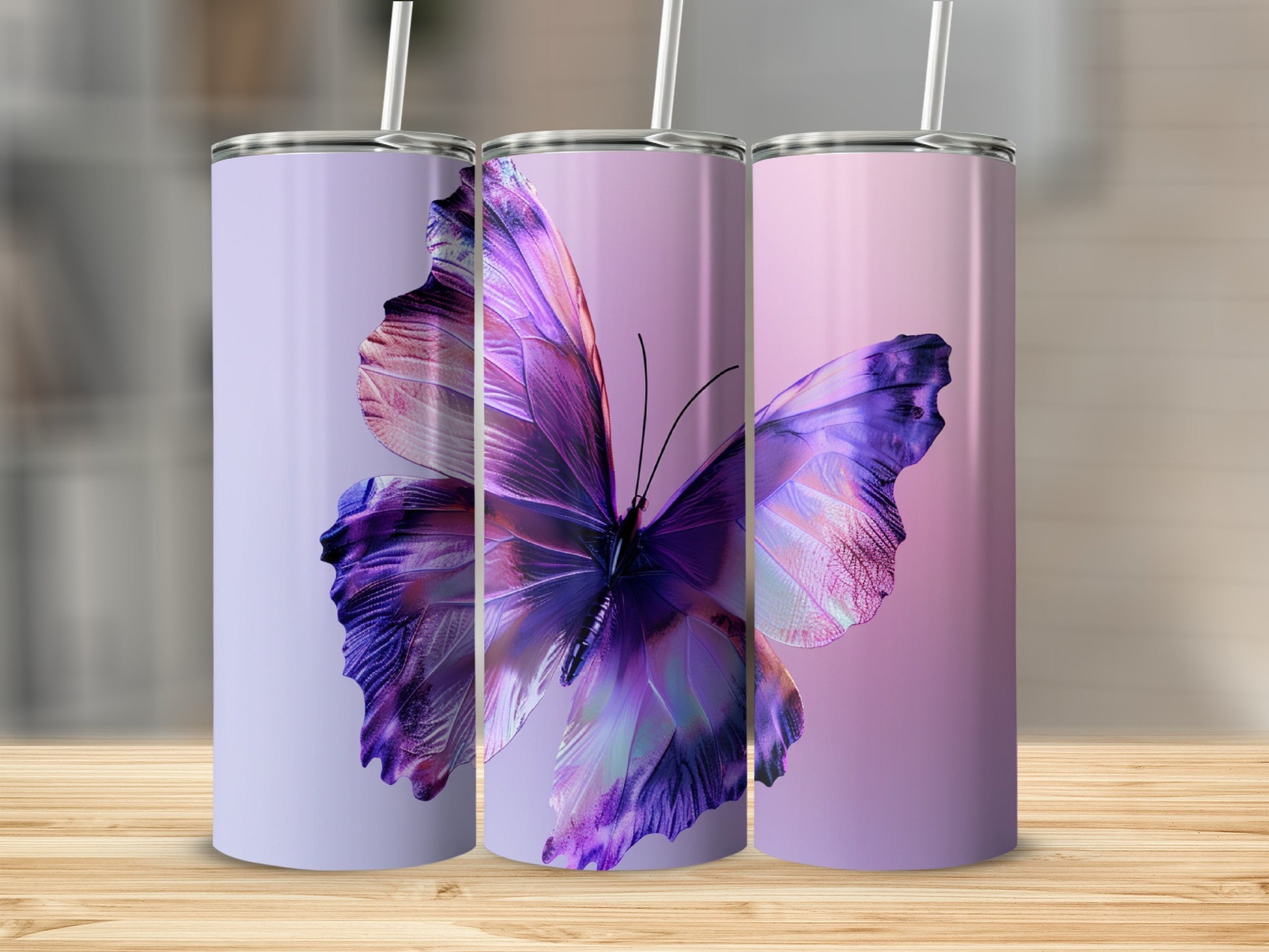 Three tumblers with iridescent purple butterfly design.