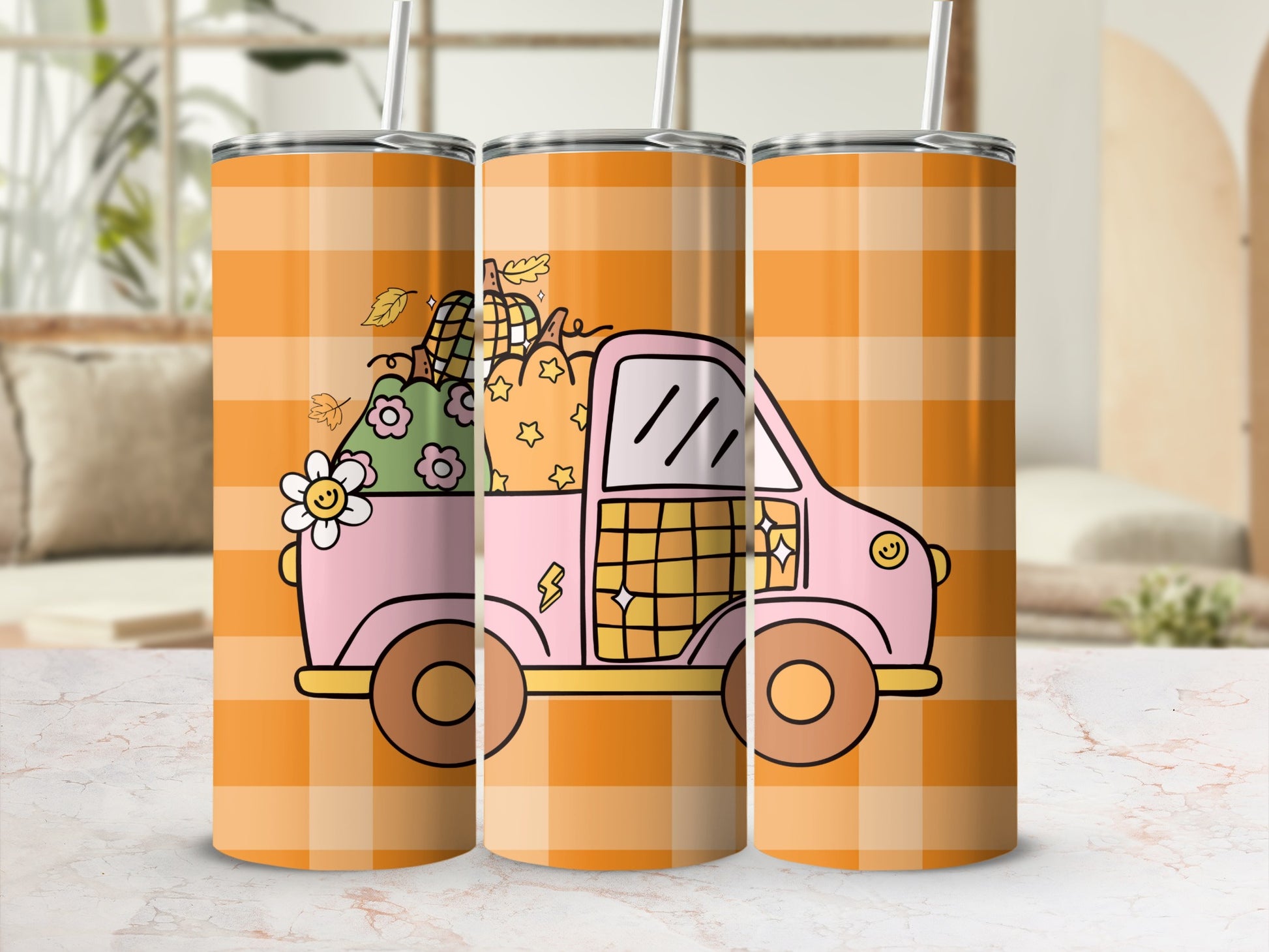 Pink truck with pumpkins and flowers on orange plaid background.