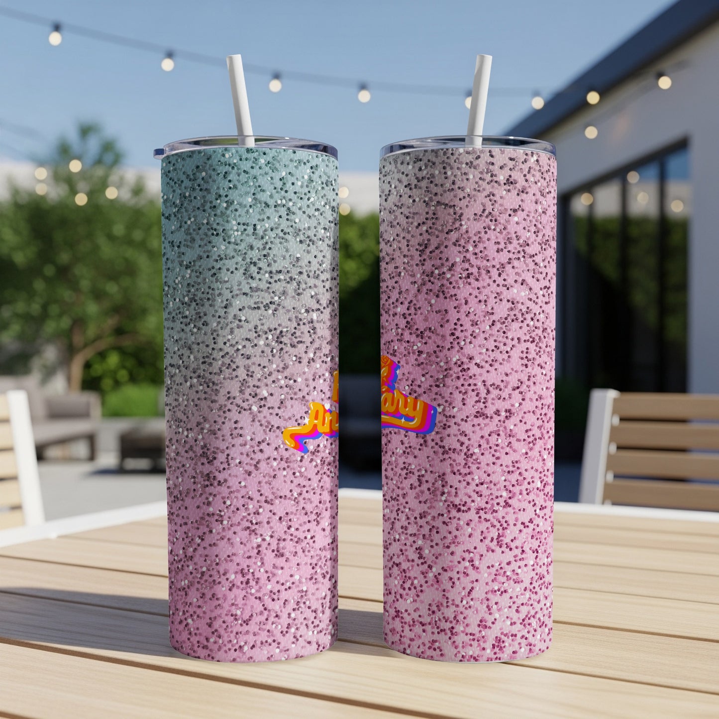 Two glitter tumblers, one teal and one pink, with "Happy Vibes" text.