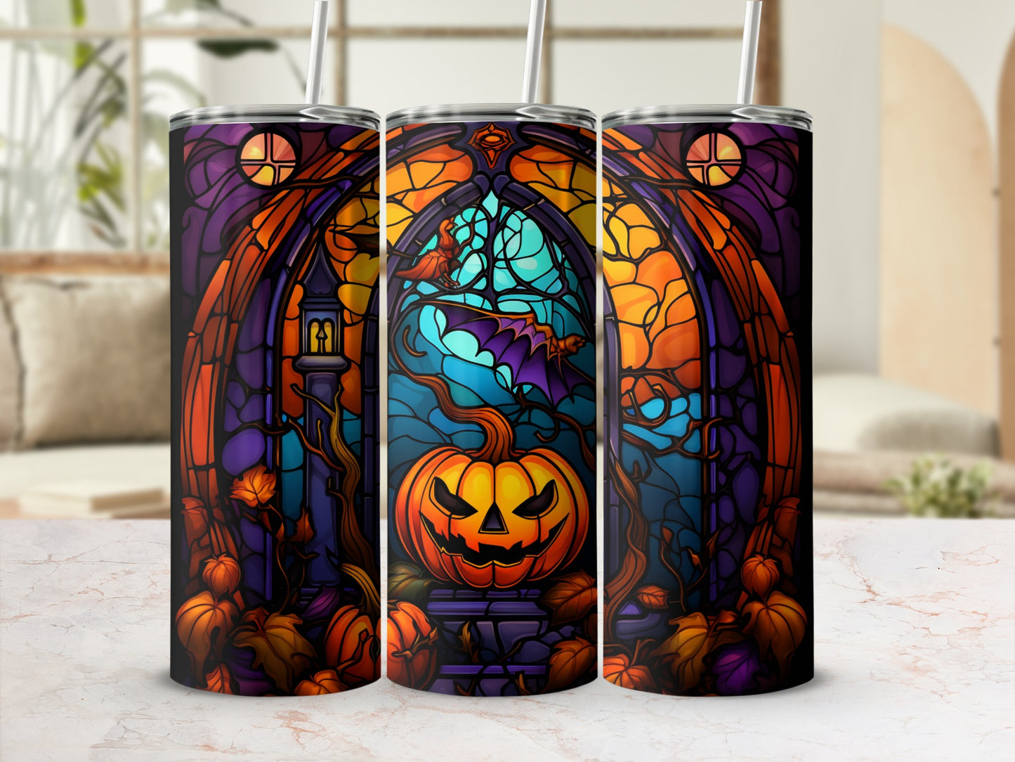 Three Halloween-themed tumblers with stained-glass art of a jack-o'-lantern, bat, and pumpkins.
