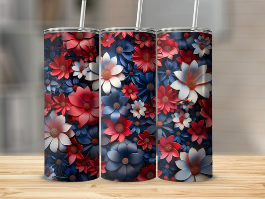 Three tumblers adorned with a repeating pattern of red, white, and blue flowers.
