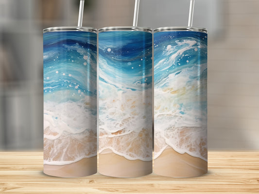 Three tumblers with a swirling ocean wave and sandy beach design.