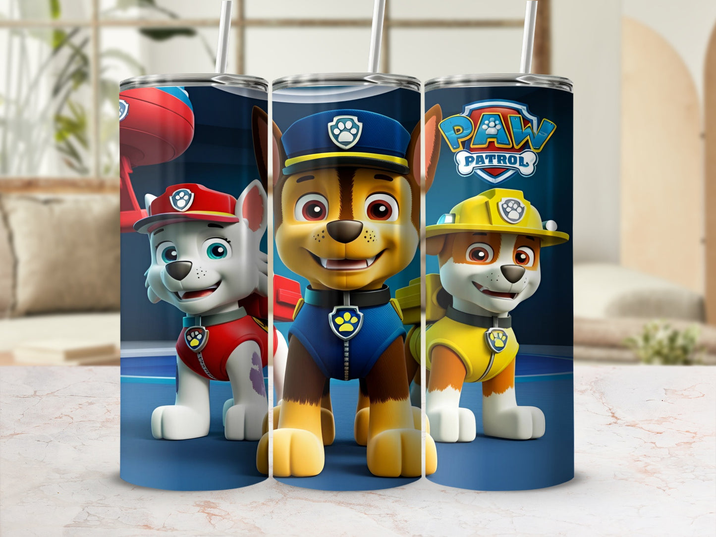 Paw Patrol characters Chase, Marshall, and Skye on a blue and white tumbler.