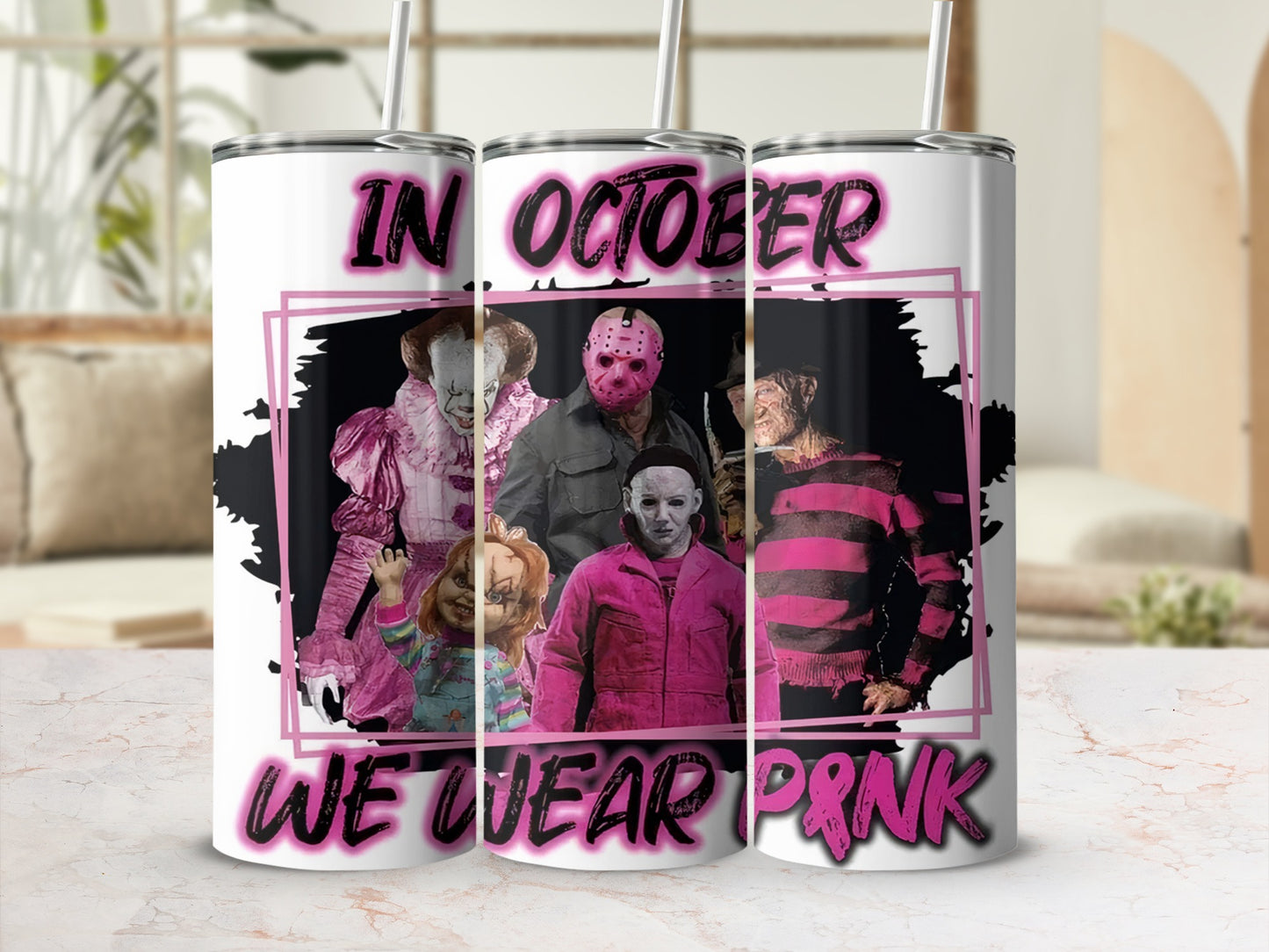 Horror characters in pink with text "In October We Wear Pink".