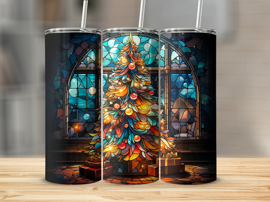 Christmas tree with stained glass background and gifts on a wooden table.