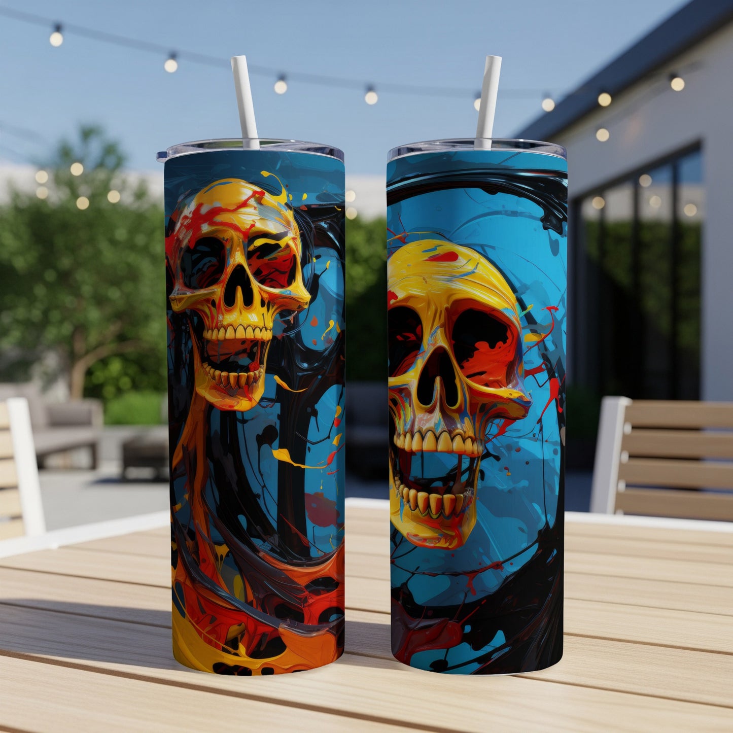 Two tumblers featuring a colorful, abstract skull design on a blue background.
