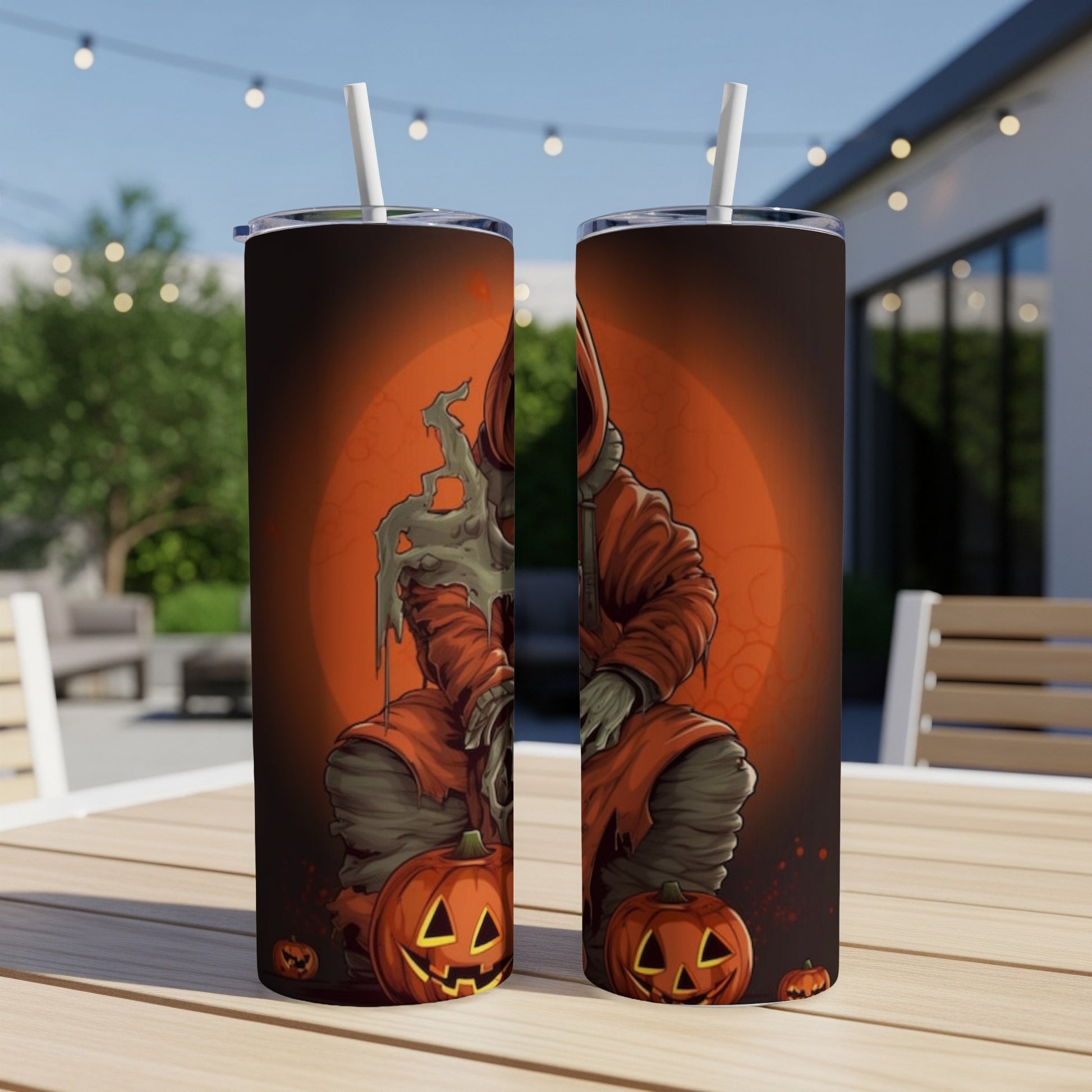 Two tumblers feature a Halloween theme with a spooky figure and pumpkins.