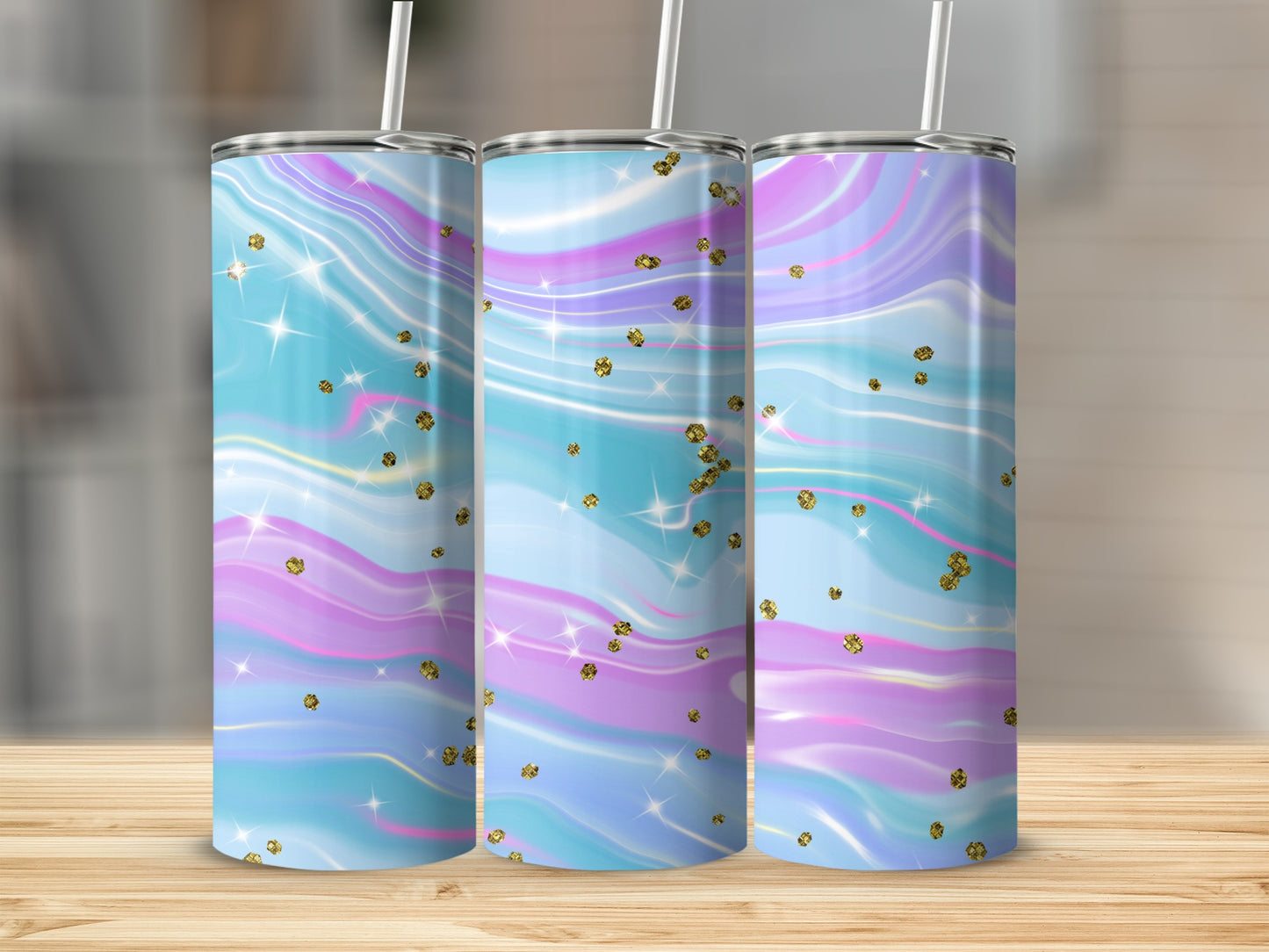 Three tumblers with pastel marble design and gold glitter accents.