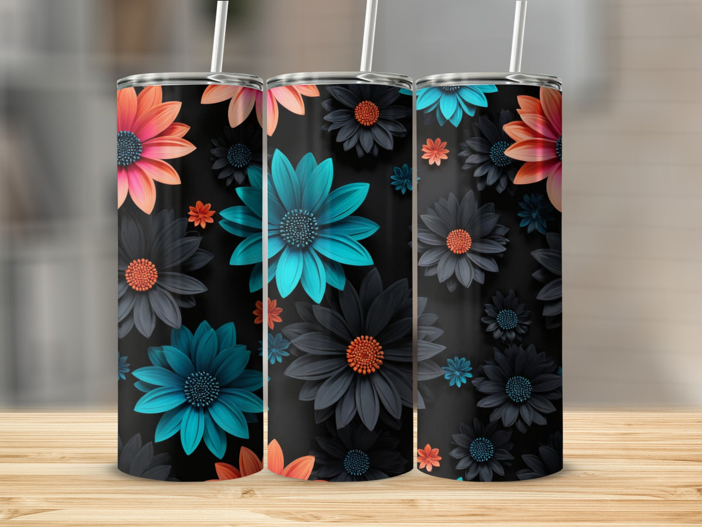 Three tumblers with teal and coral floral patterns on black.