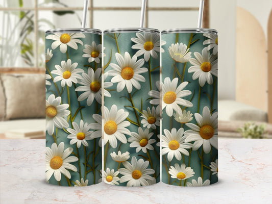 Three tumblers featuring a repeating pattern of white daisies on a teal background.