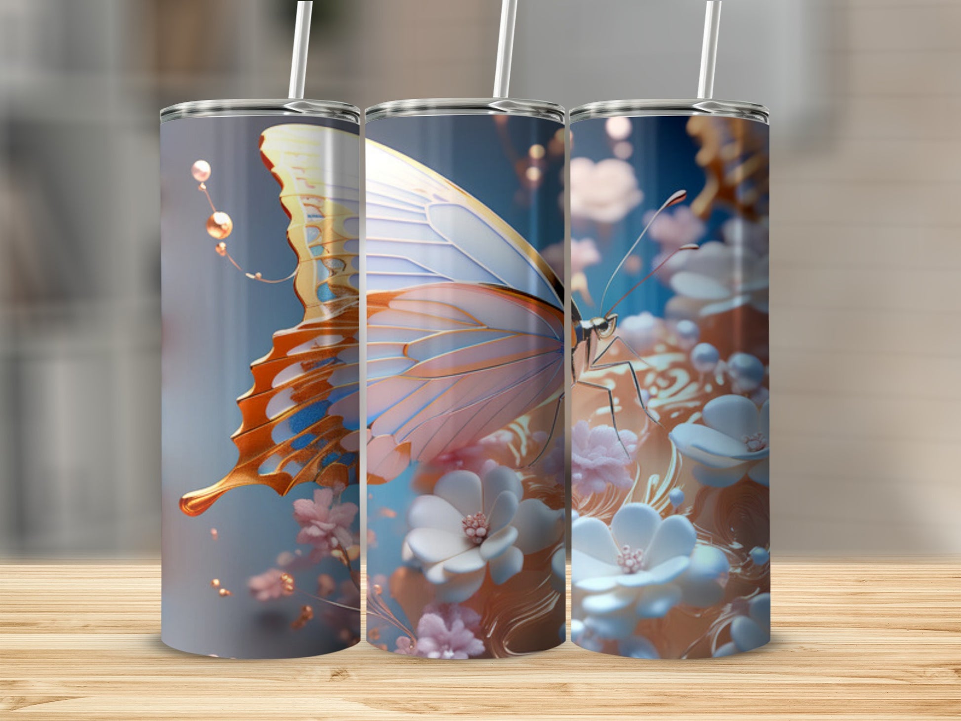 Triptych of tumblers featuring a butterfly and floral design.