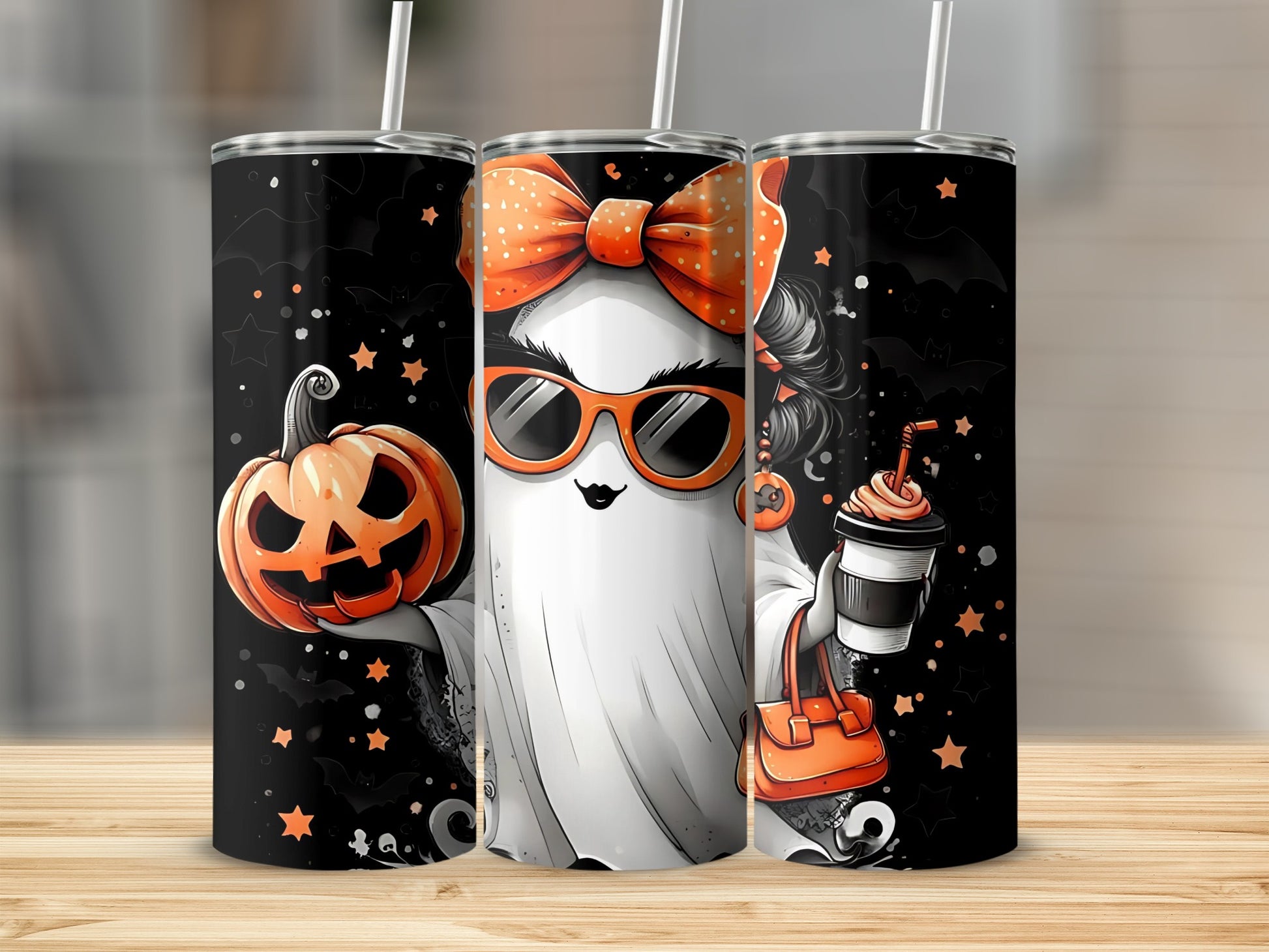 Halloween ghost graphic on tumblers with pumpkin, coffee, and purse.