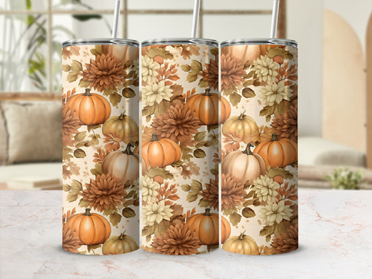 Tumbler with a fall floral and pumpkin pattern.