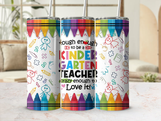Rainbow crayon tumbler with "Kindergarten Teacher" text and doodles.