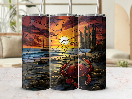 Crab and castle by the sea at sunset, stained glass design on tumbler.