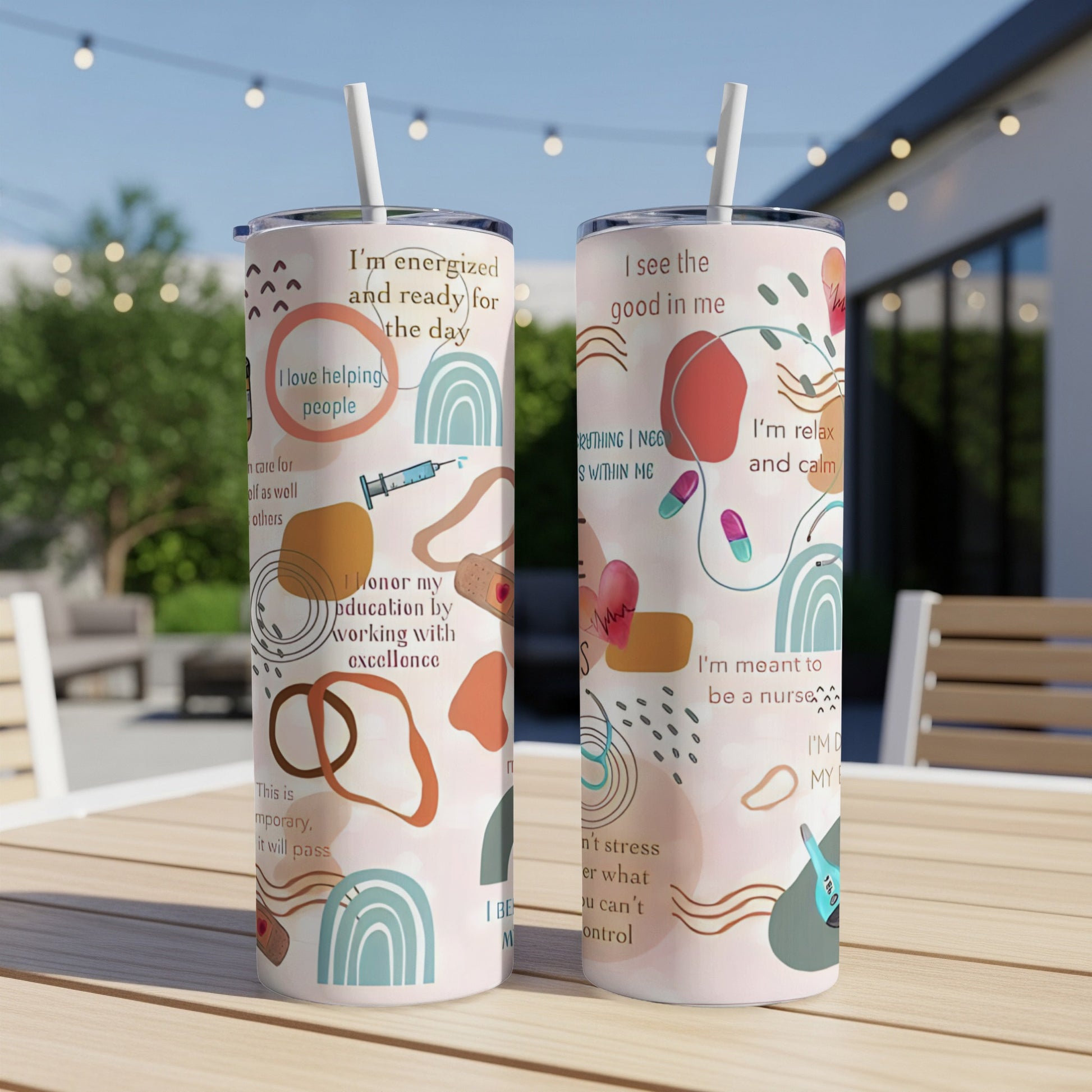 Two tumblers with abstract art and inspirational nursing quotes.