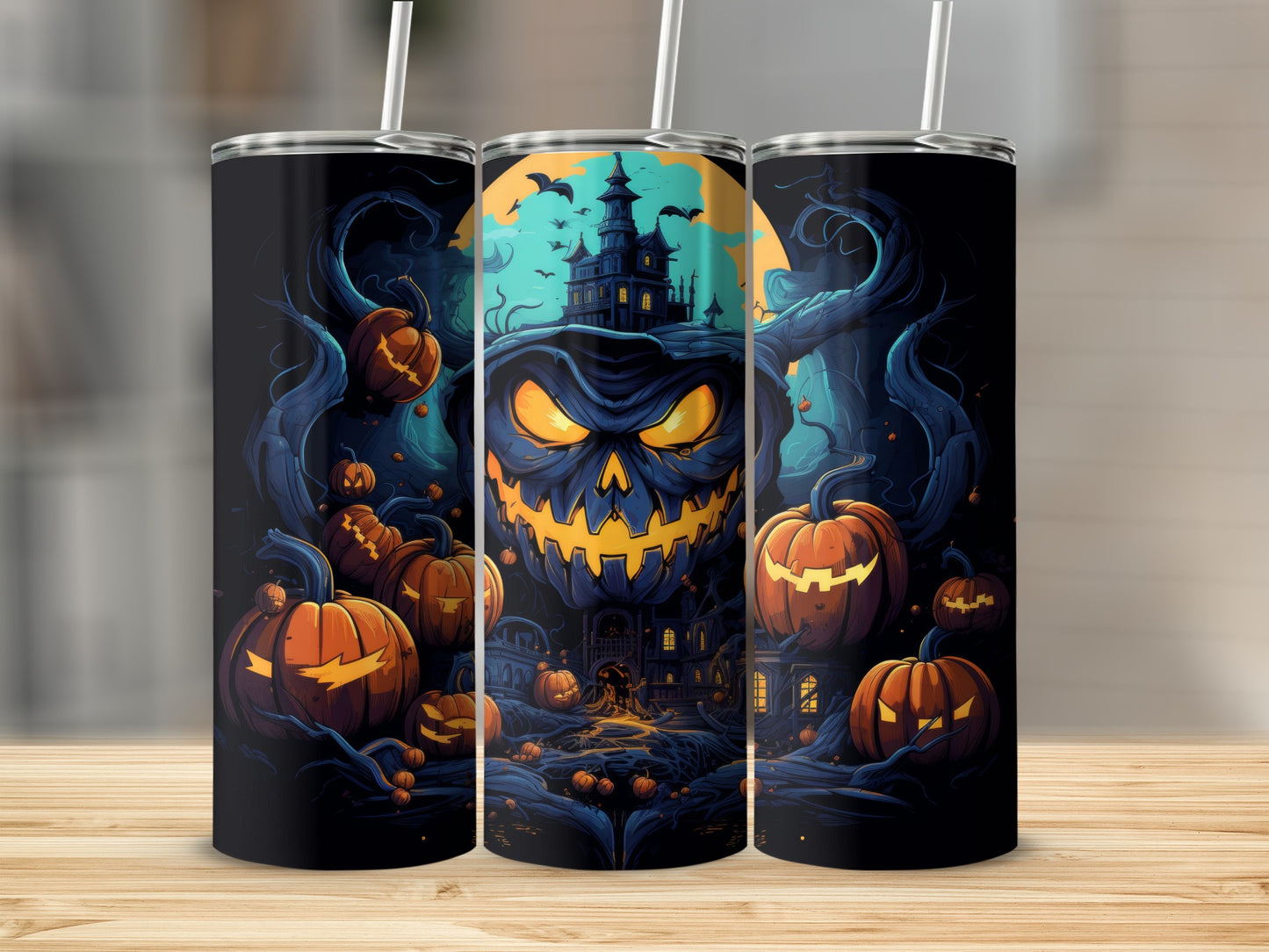 Halloween tumbler with a spooky jack-o'-lantern face, haunted house, and pumpkins.