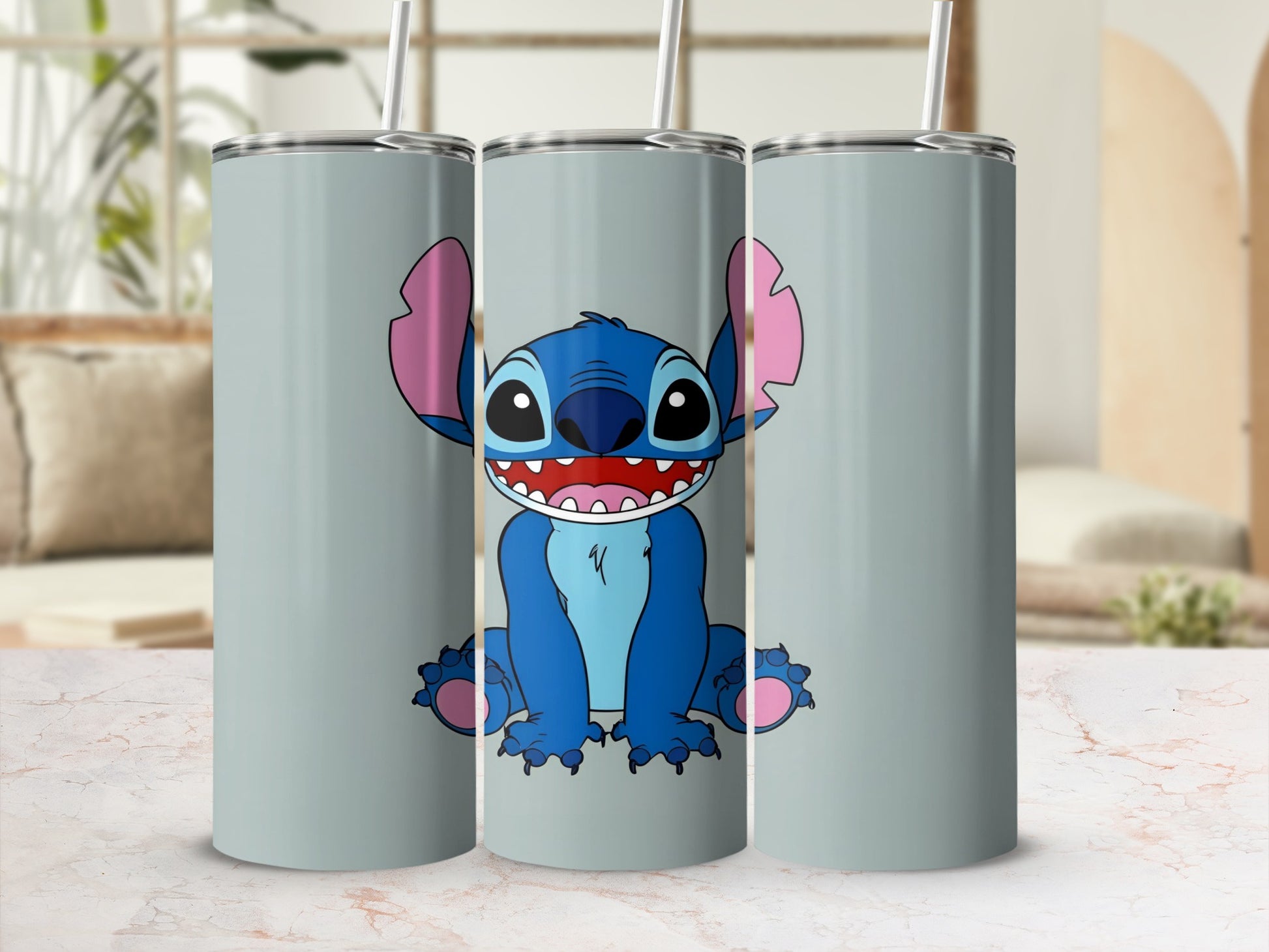 Stitch from Lilo & Stitch smiling with straw on grey tumbler.