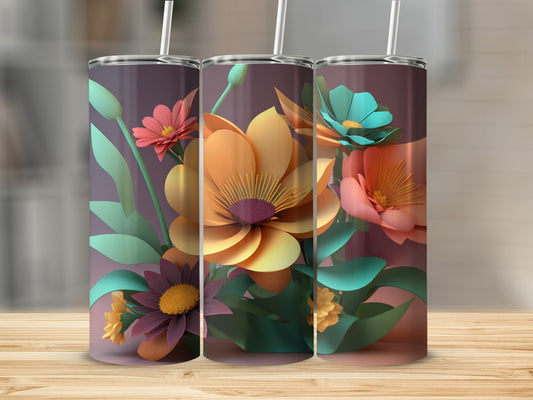 Three floral tumblers with vibrant colors on a wooden surface.