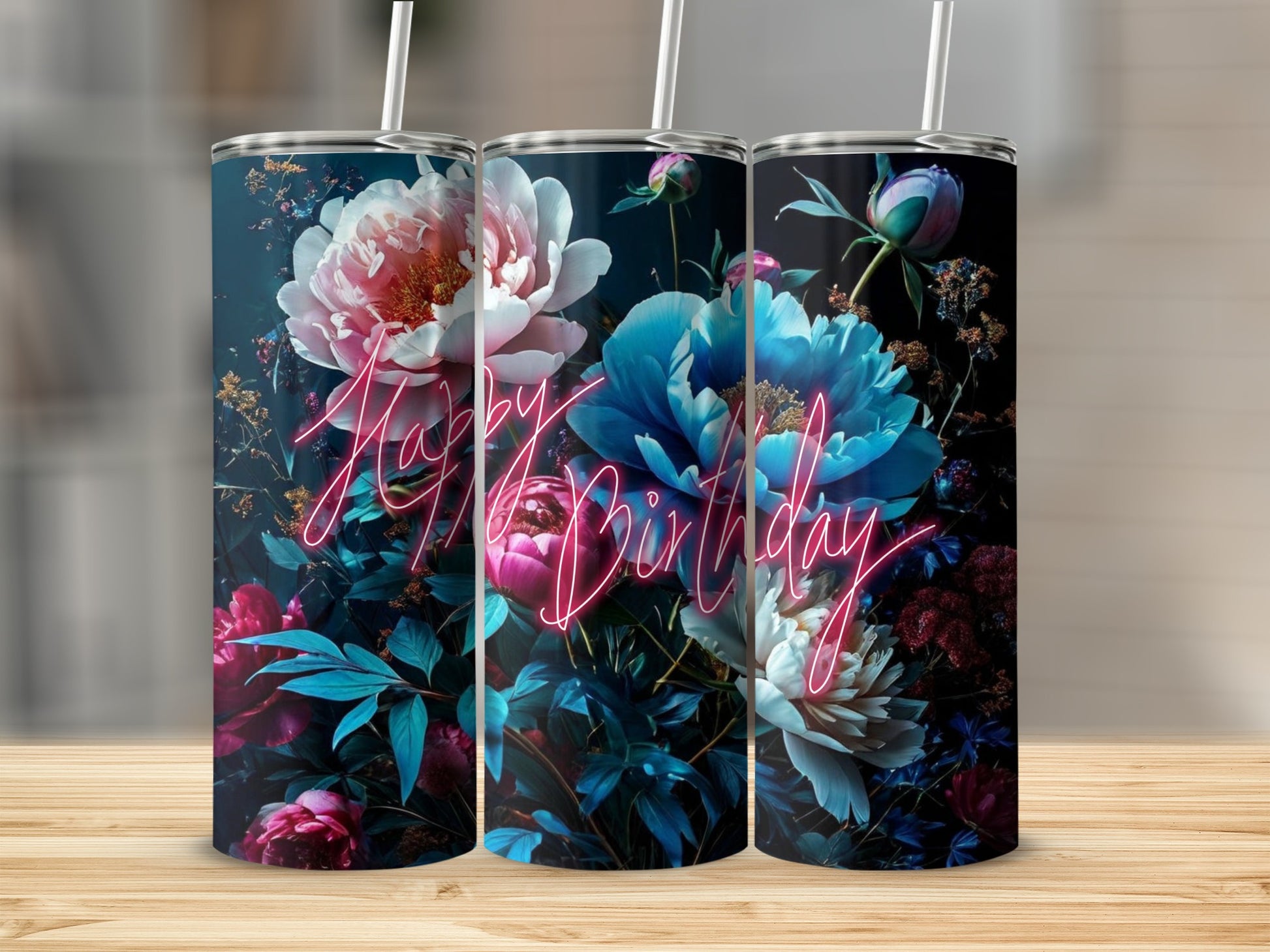 Birthday tumbler with vibrant blue and pink flowers and neon text.