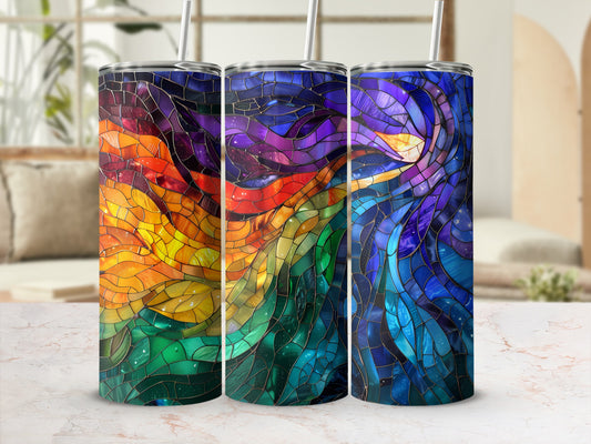 Three tumblers with stained glass designs in rainbow and cosmic patterns.