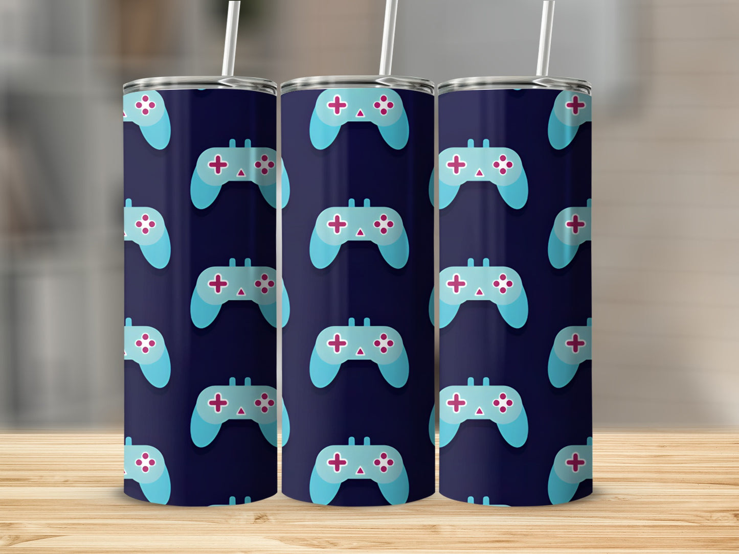Dark blue tumbler with a repeating pattern of light blue video game controllers.