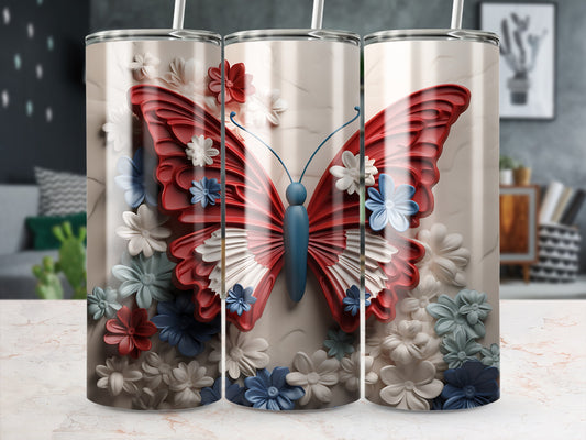 Butterfly design tumbler with red, white, and blue flowers.