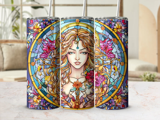 Stained glass tumbler featuring a woman with flowers and celestial motifs.