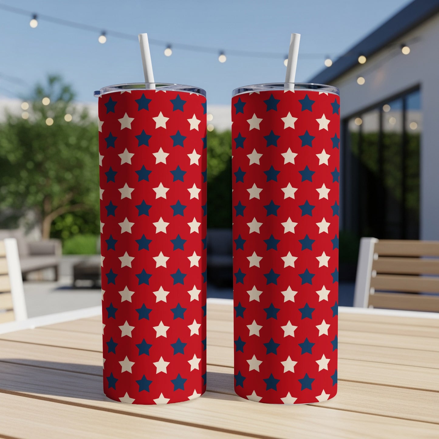 Two tumblers with a red background and an all-over pattern of blue and white stars.