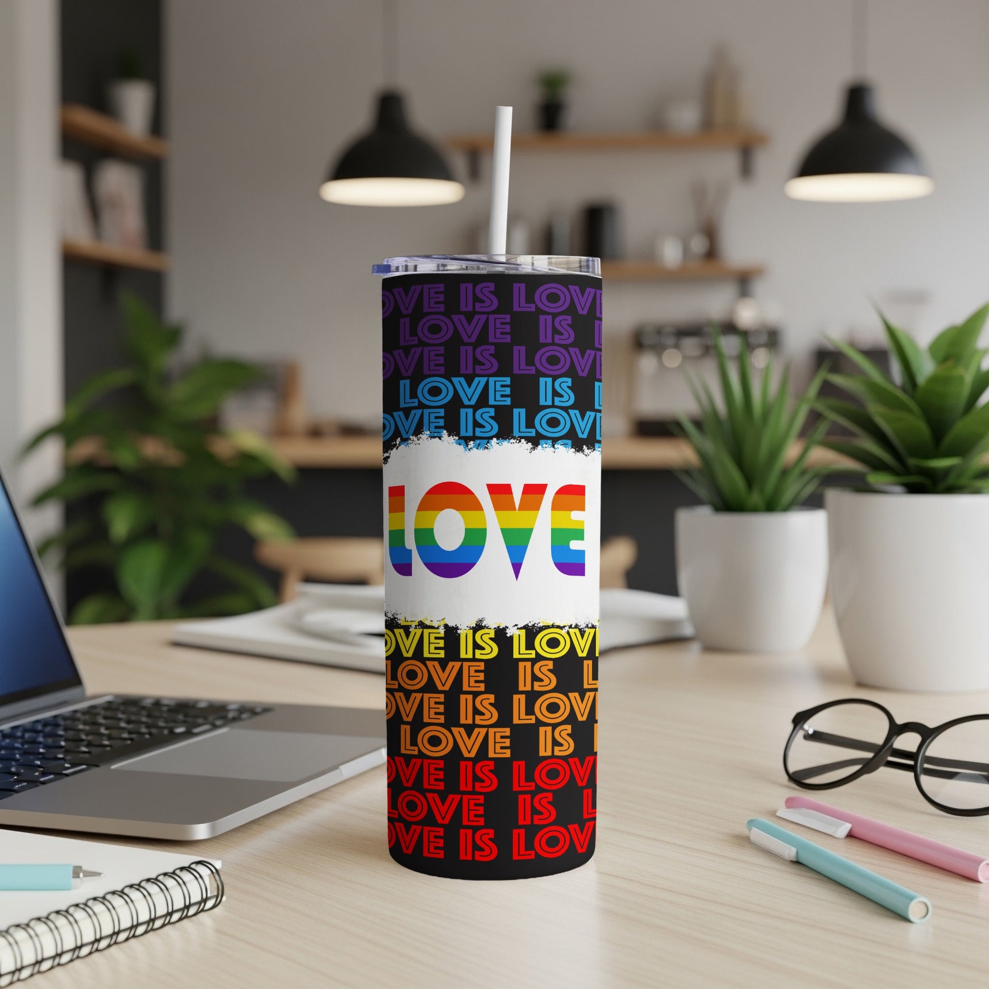 Tumbler with "LOVE IS LOVE" text in rainbow gradient and repeating text.