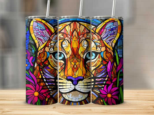 Stained glass tiger face with colorful flowers on a tumbler.