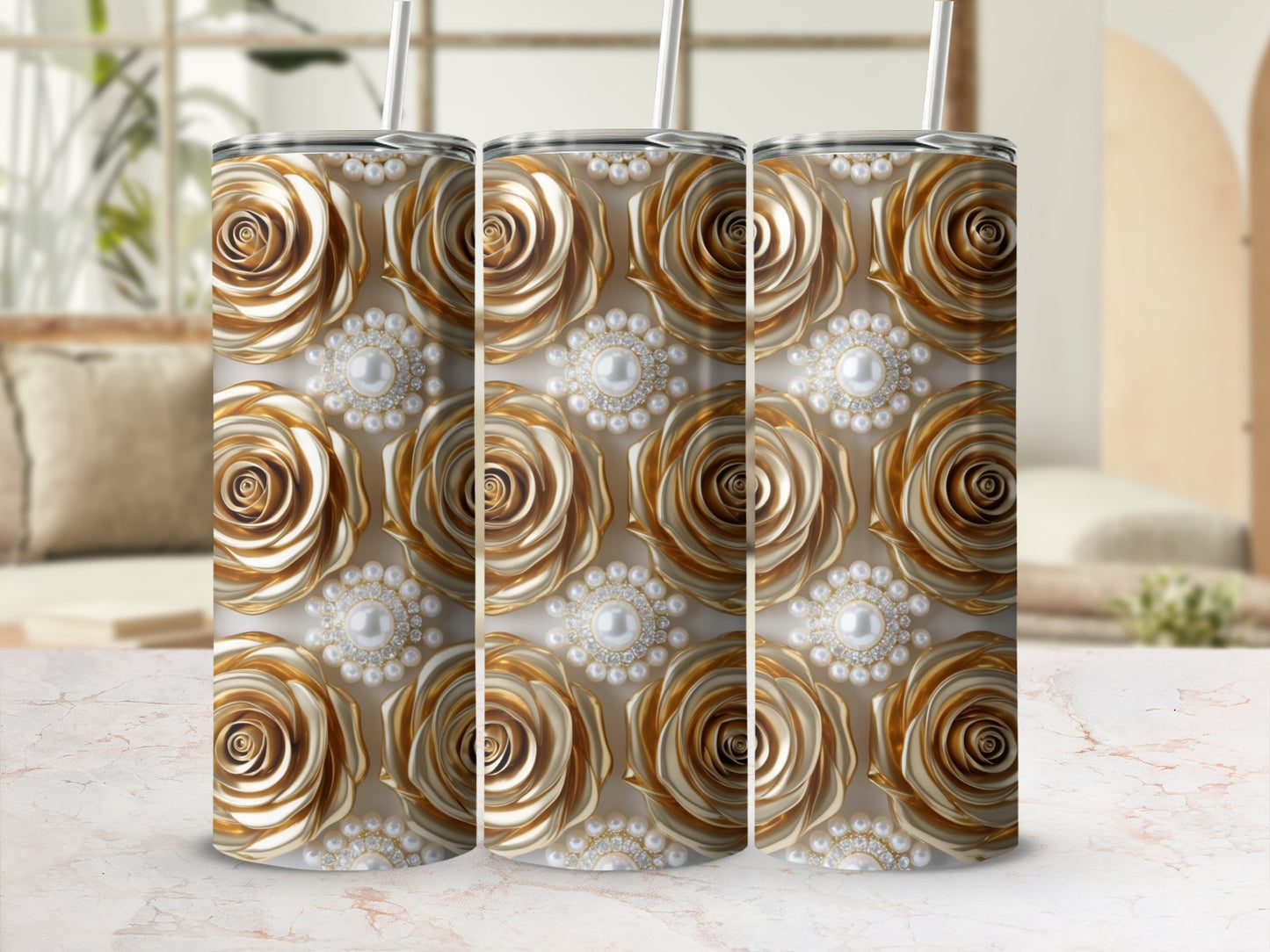 Gold rose and pearl pattern on three tumblers.