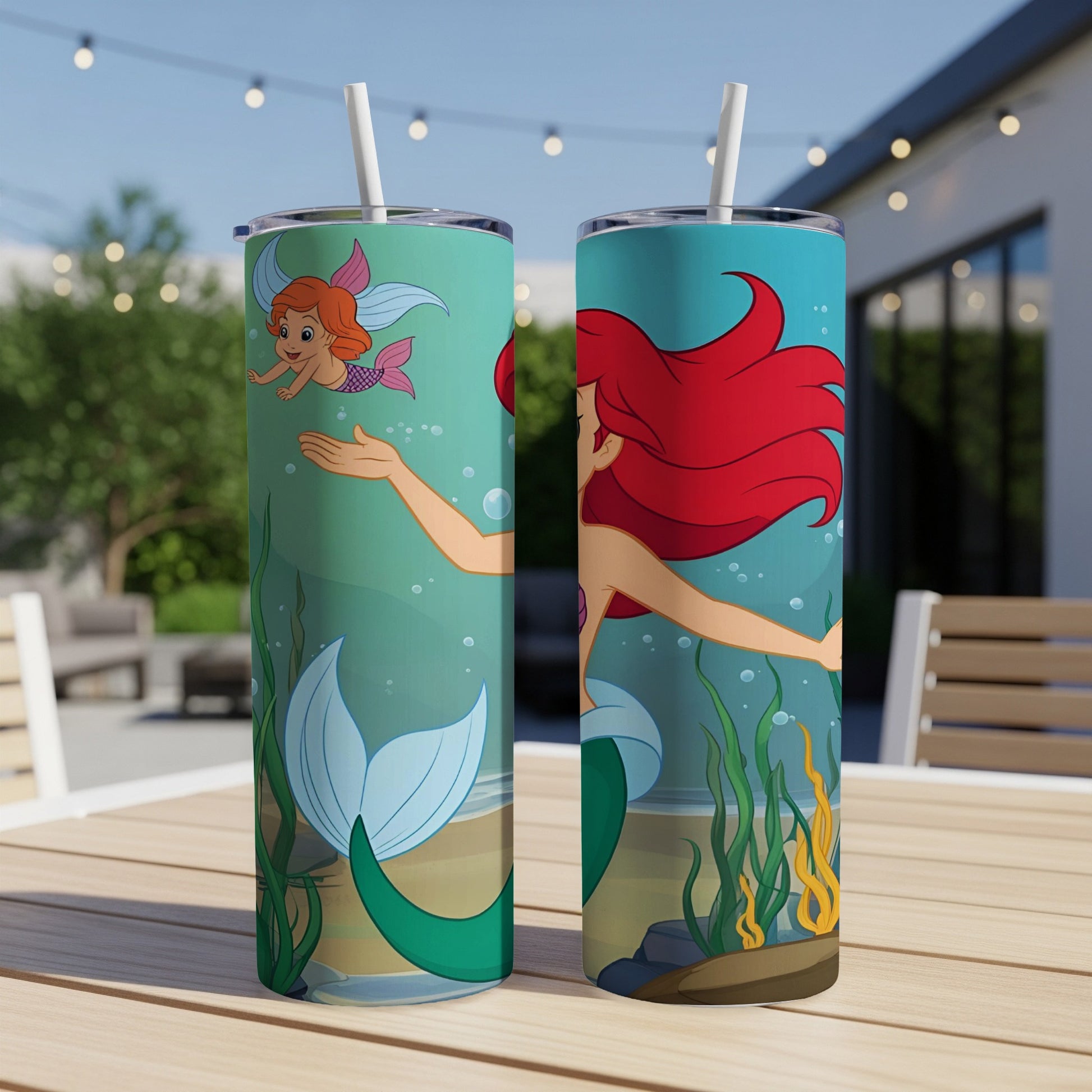 Ariel and Flounder from The Little Mermaid on a teal and green tumbler.