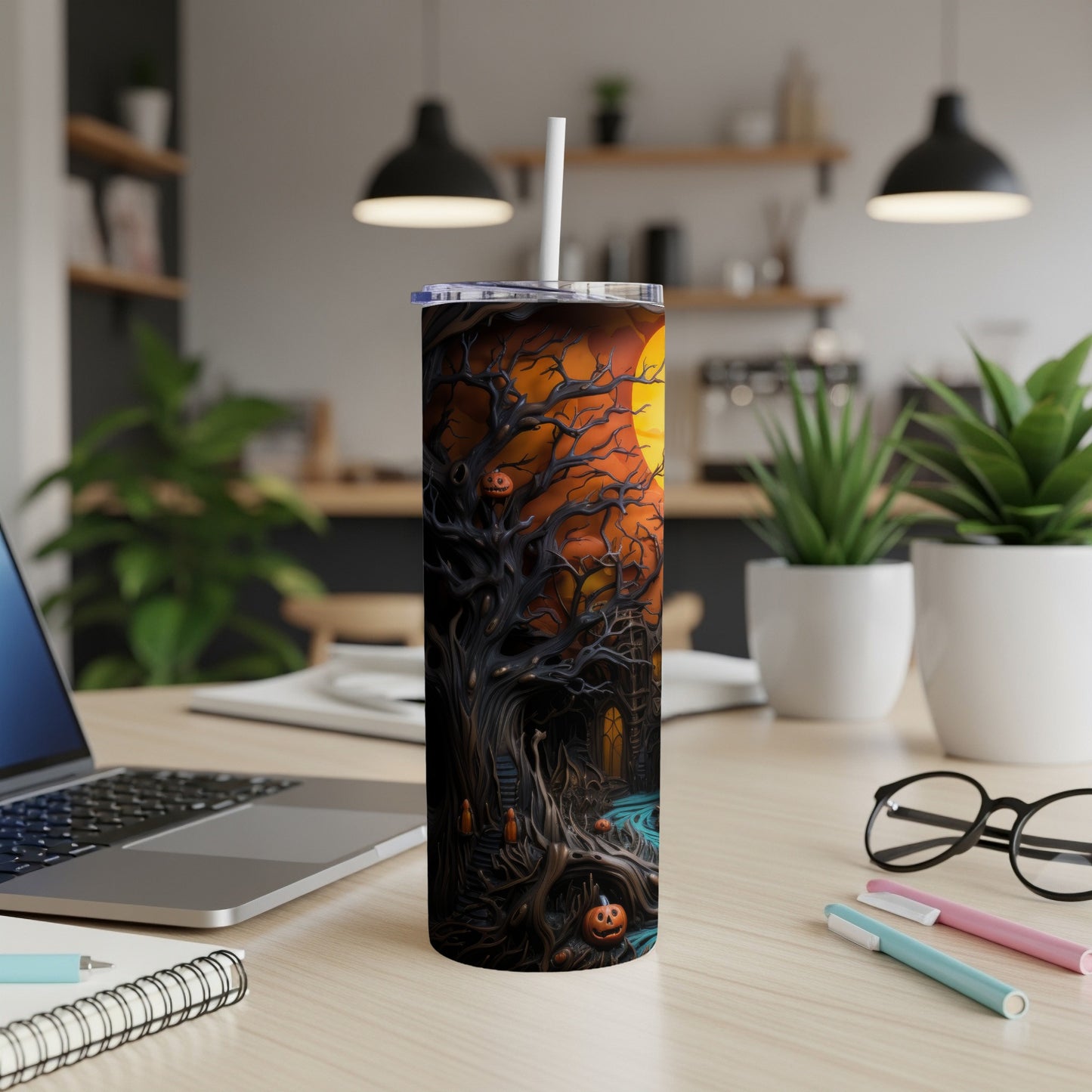Halloween tumbler with spooky tree, pumpkins, and full moon design.