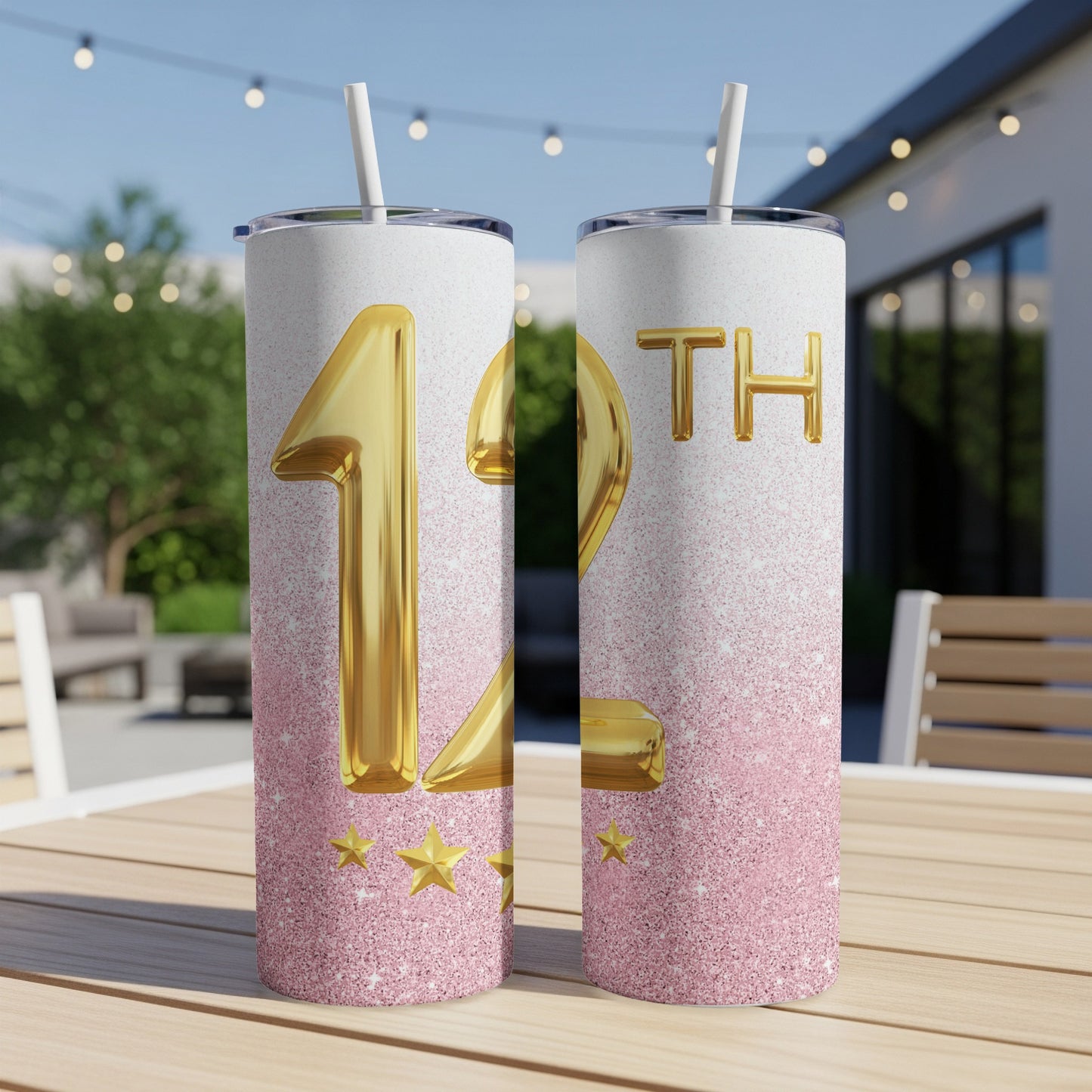 Gold "12th" numeral with pink glitter on two tumblers.