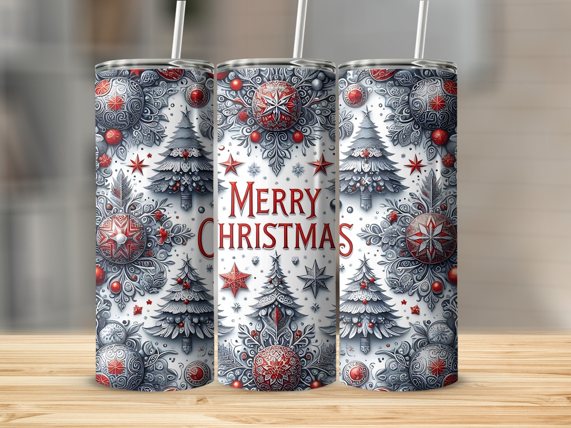 Three cylindrical tumblers with a festive Christmas tree and ornament design.