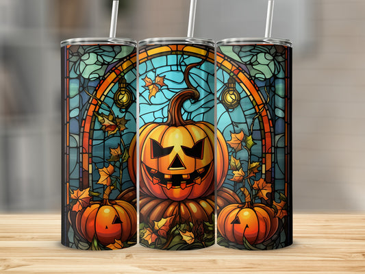 Three tumblers featuring a stained-glass style jack-o'-lantern and autumn leaves design.